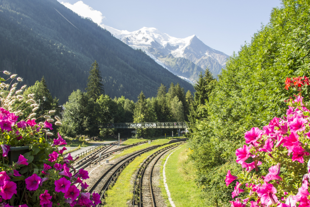 Aiguille du Gouter and Dome du Gouter as seen from the town of Chamonix, France. Swiss Alps summer vacation.