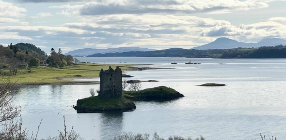 See the ruins of Castle Stalker, Loch Laich, on GeoCultura's luxury Scotland vacation