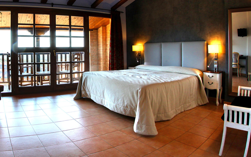 Bedroom in Hotel Villa de Alquezar, Spain.