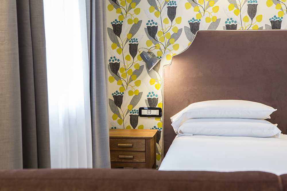 Bedroom in Hotel Duca D'Aosta, Aosta, Italy.