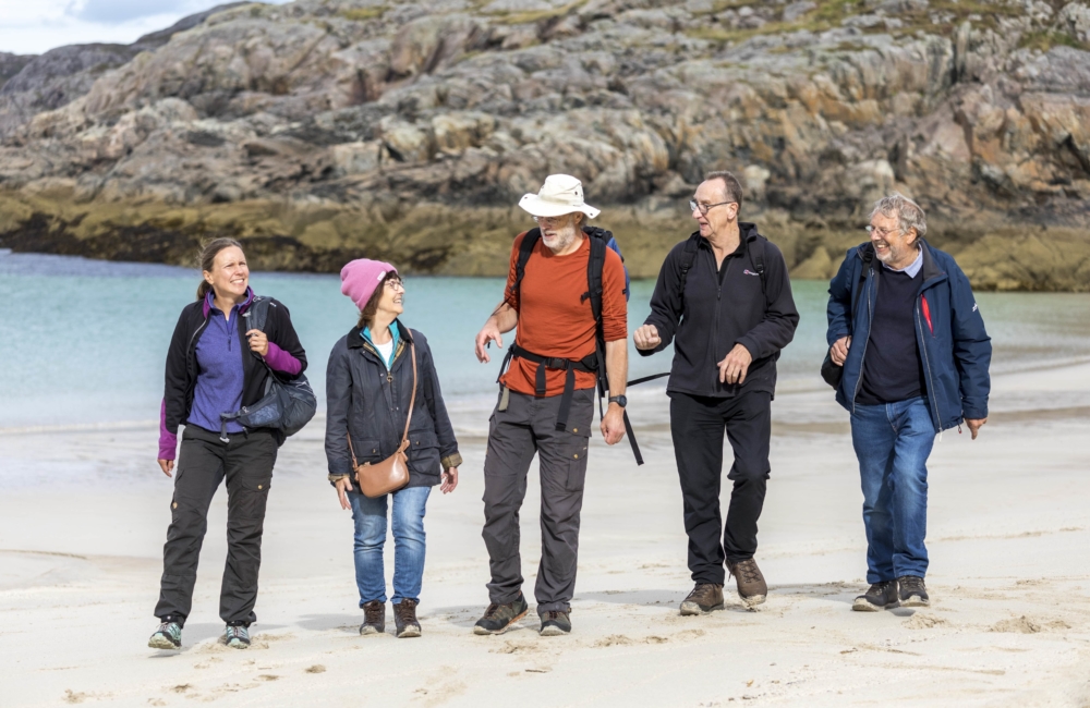 GeoCultura small group travel tour on the beach at Assynt, NW Highlands.