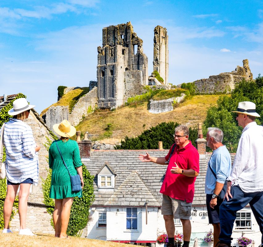 View of Corfe Castle from Corfe Village, Dorset, England.