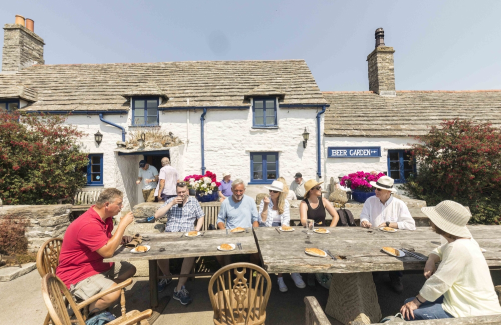 Enjoying pasties at the Square & Compass, Swanage.