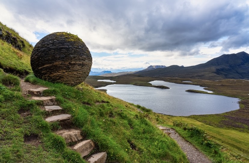 Ball of stacked slate slabs, Knockan Crag, Scotland.