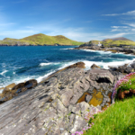 Valentina Island Lighthouse at Cromwell Point, Dingle Peninsula, Geological site, County Kerry, Ireland.